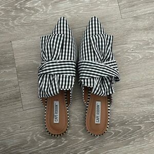 Pointed black and white plaid mules